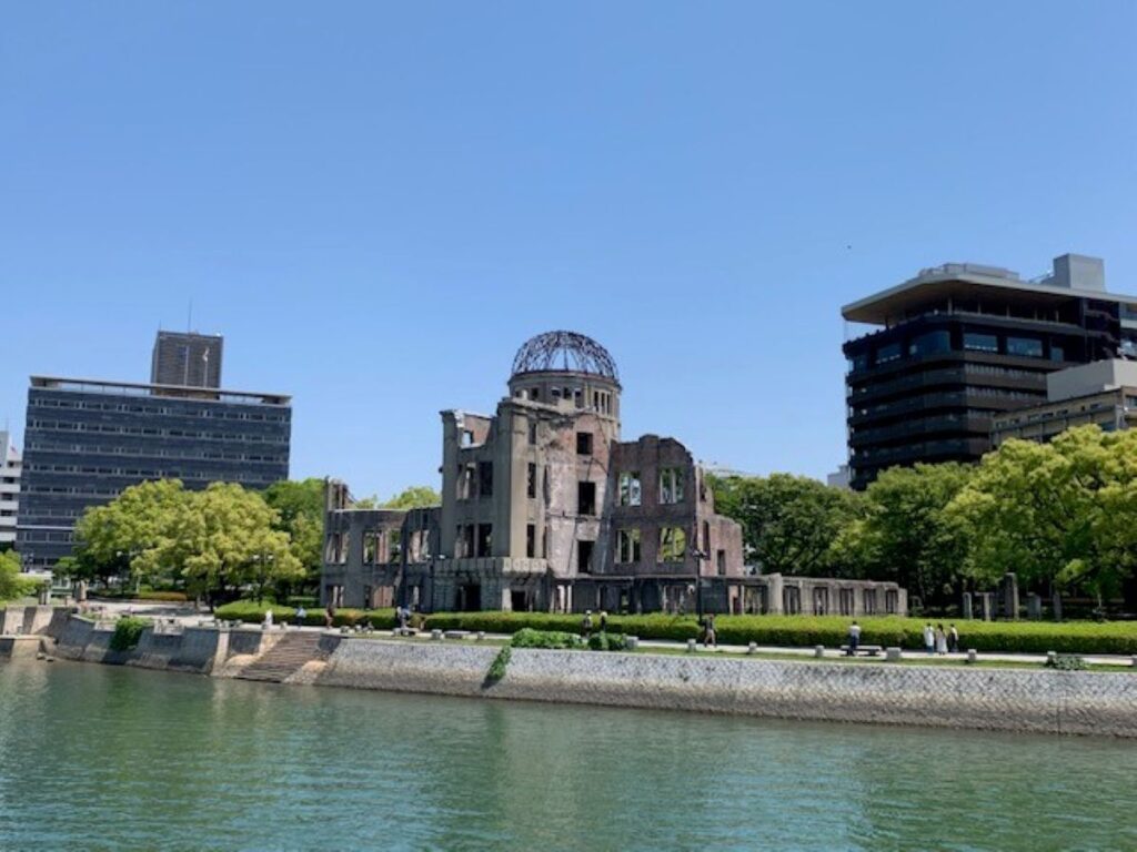 Hiroshima Peace Memorial's skeletal atomic bomb dome ruins preserved beside the Motoyasu River