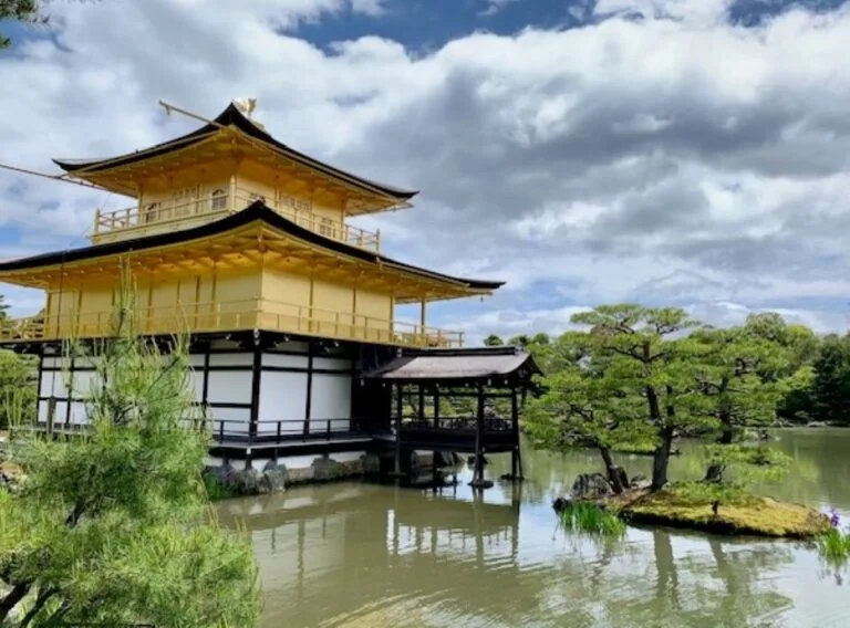Kinkaku-ji Golden Pavilion reflected in pond surrounded by gardens, Kyoto's most iconic temple essential for any visitor