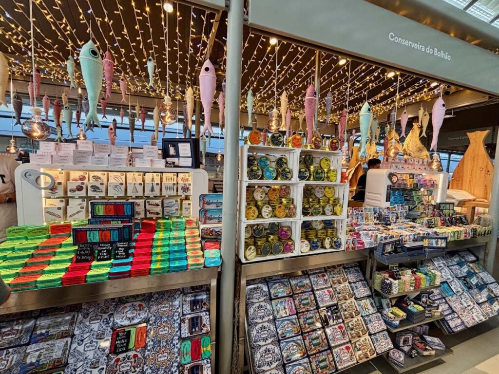 Portuguese sardine souvenirs and local products at Bolhão Market, popular shopping destination for Porto day trips