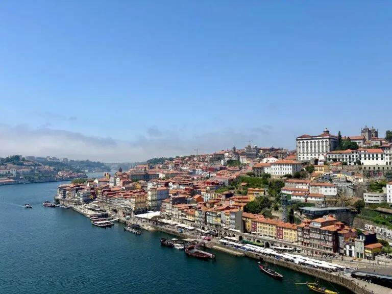 Porto's colourful Ribeira district along Douro River with traditional houses and waterfront restaurants, UNESCO World Heritage site