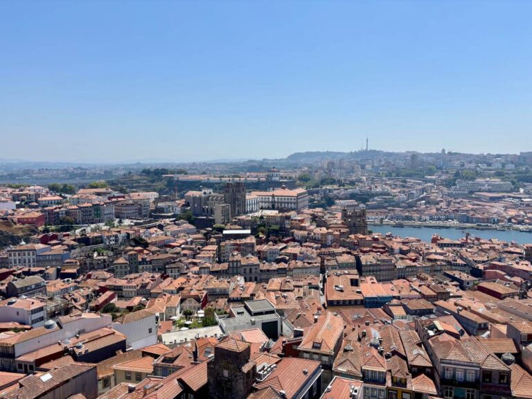 Aerial view of Porto's terracotta rooftops and historic centre, revealing the city's compact layout ideal for short breaks