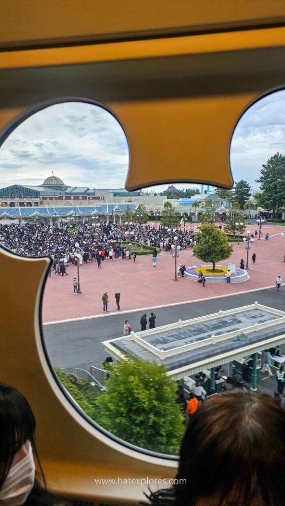 View through a Mickey-shaped window on the Disney Resort Line monorail at Tokyo DisneySea