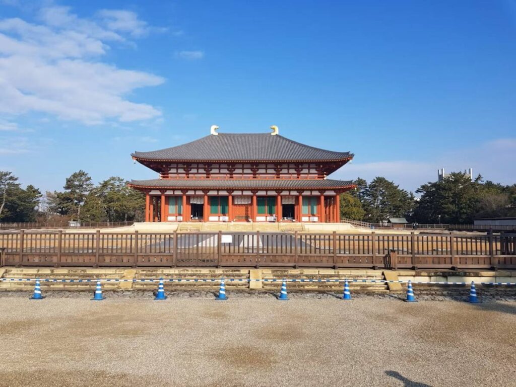 Central Golden Hall at Kofuku-ji Temple in Nara with vermillion columns and double-layered roof
