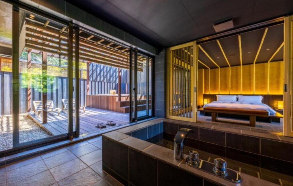 Luxury ryokan suite with private indoor onsen and wooden terrace in Hakone