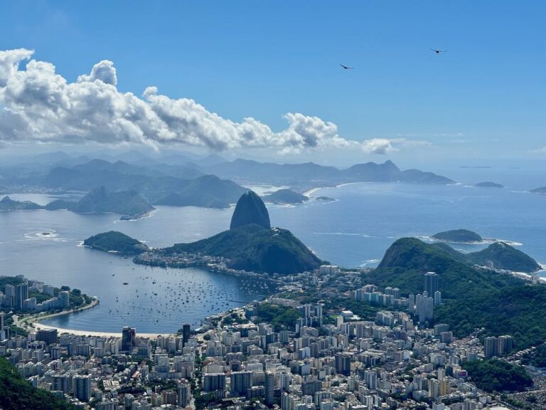 Sugarloaf Mountain and Botafogo Bay viewed from the top of Corcovado, boats anchored in the harbour, Niterói in the distance